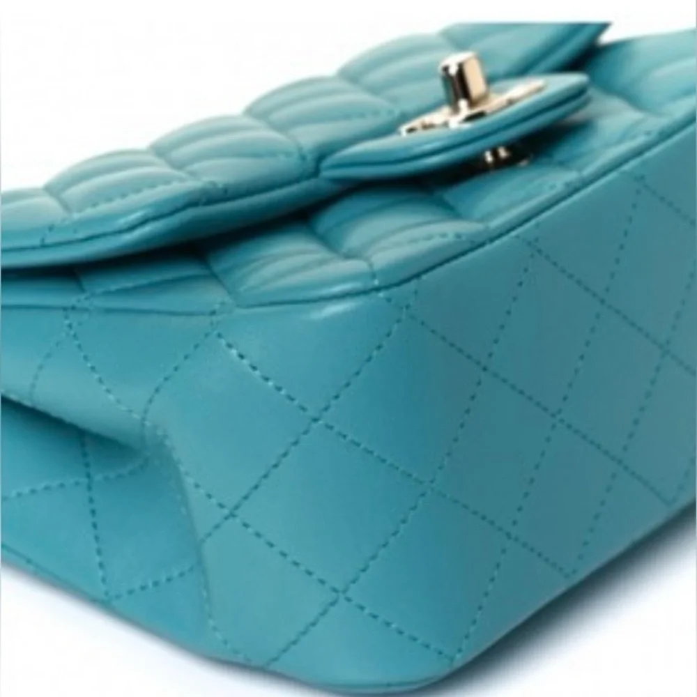 Like new Chanel mini square classic flap  in lambskin